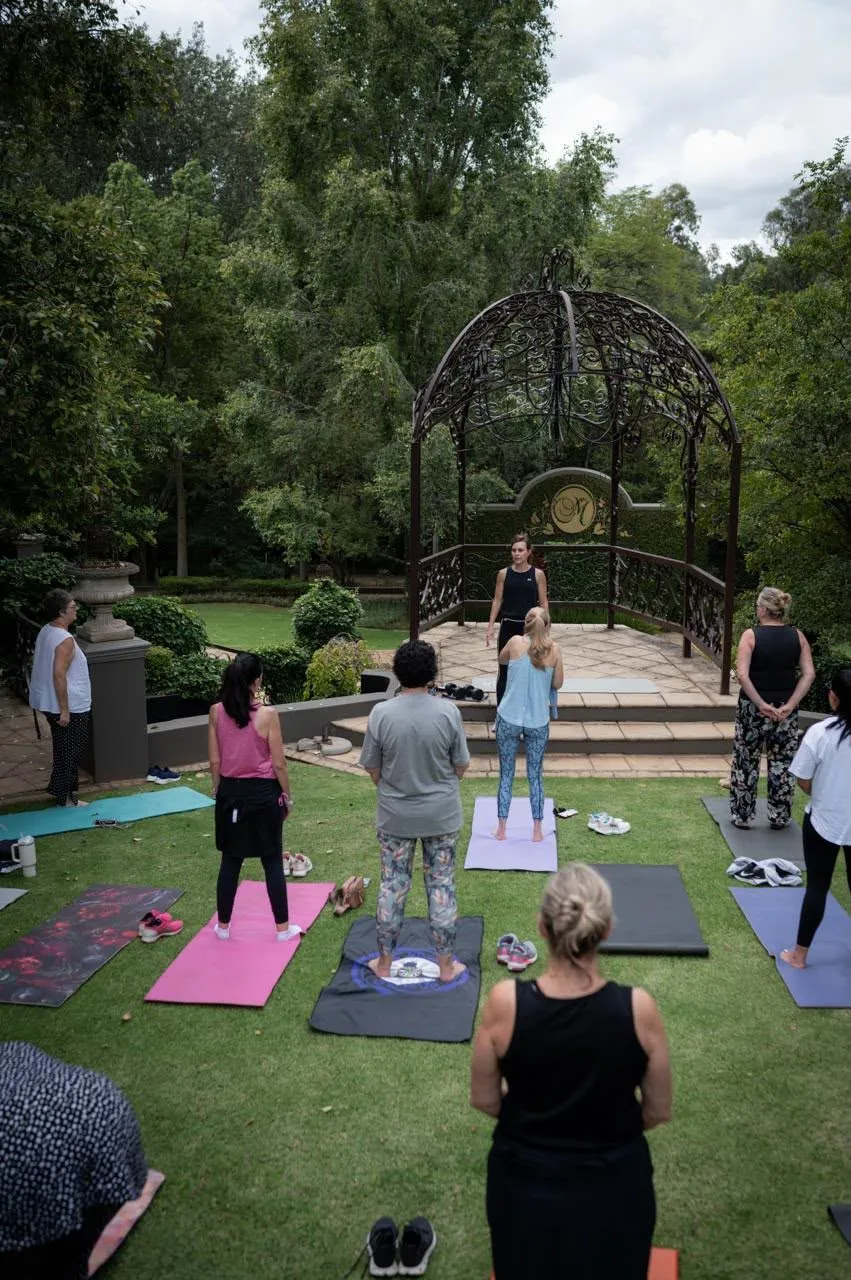 Women in a group movement session at the retreat